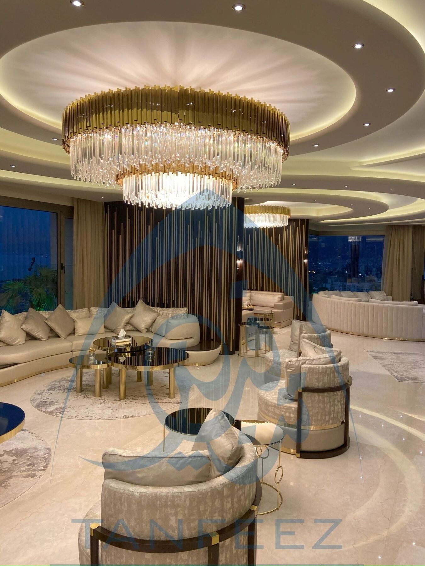 Open living space with a round crystal chandelier